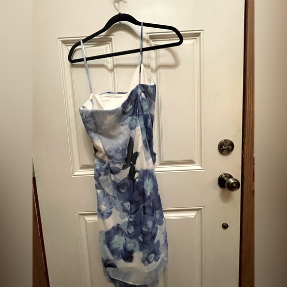 le chateau Dresses & Skirts - Le Chateau white & Blue floral medium dress. Very unique one shoulder style.